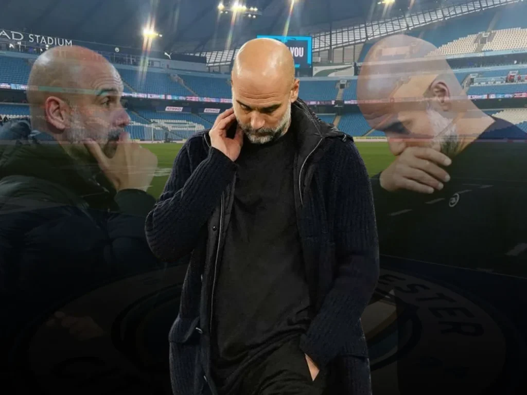 Pep Guardiola at Etihad Stadium with partial text "AD STADIUM" visible.