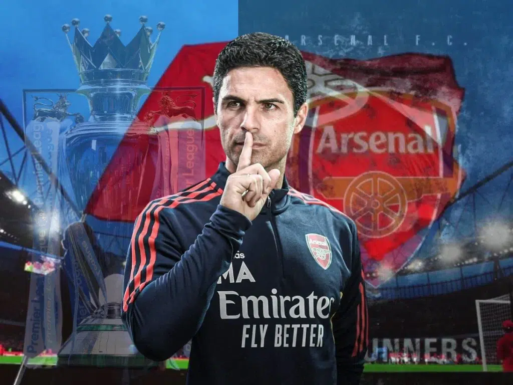 A dynamic collage featuring Arsenal FC manager Mikel Arteta, alongside the Arsenal logo, a football, and fragmented text including "Arsenal", "Emirates FLY BETTER", and "Premier League trophy