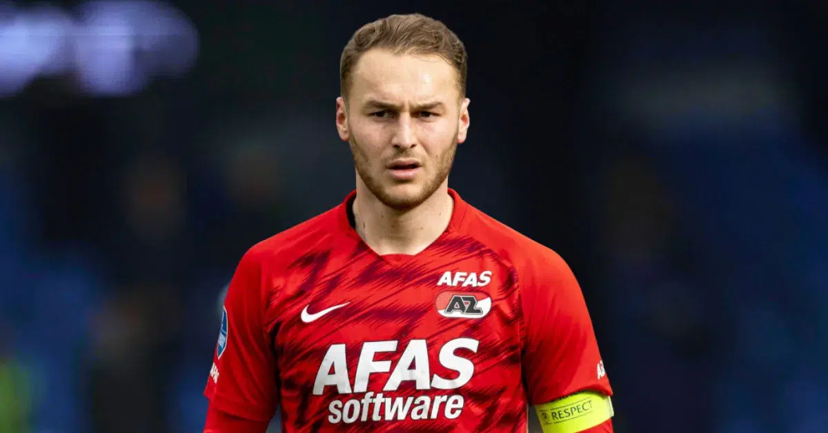 AZ Alkmaar captain in action, displaying determination and focus during a crucial match.