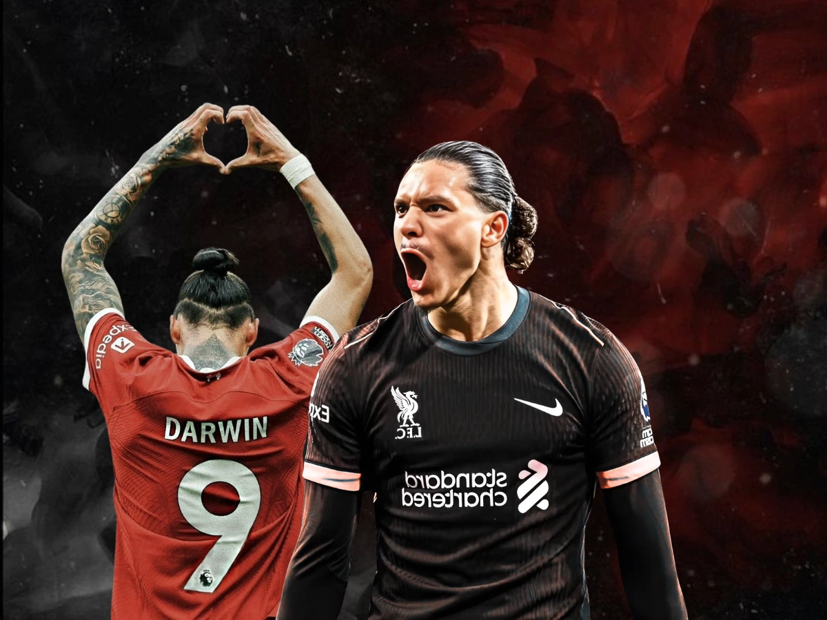 Darwin Núñez in two poses: one celebrating in a red Liverpool jersey and another roaring in a black Liverpool kit, set against a dark red background.