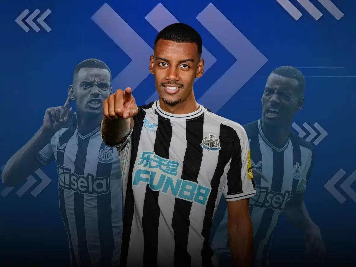 Alexander Isak, a Newcastle United player, wearing the club's black-and-white striped jersey, pointing towards the camera with a confident expression. Two faded images of him celebrating are in the background against a blue design.