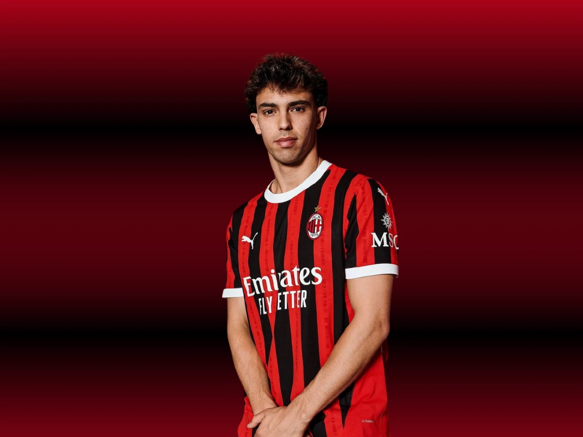 João Félix wearing an AC Milan jersey against a red and black gradient background.