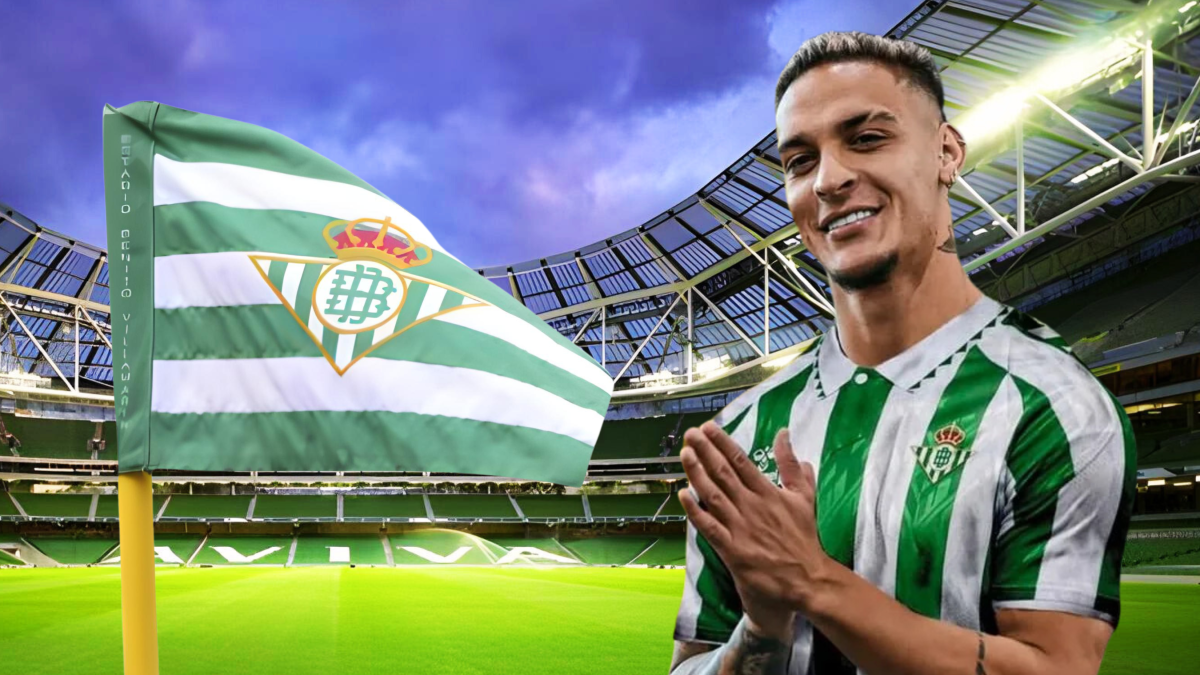 Antony, the Brazilian winger, in Real Betis jersey, celebrating on the field.