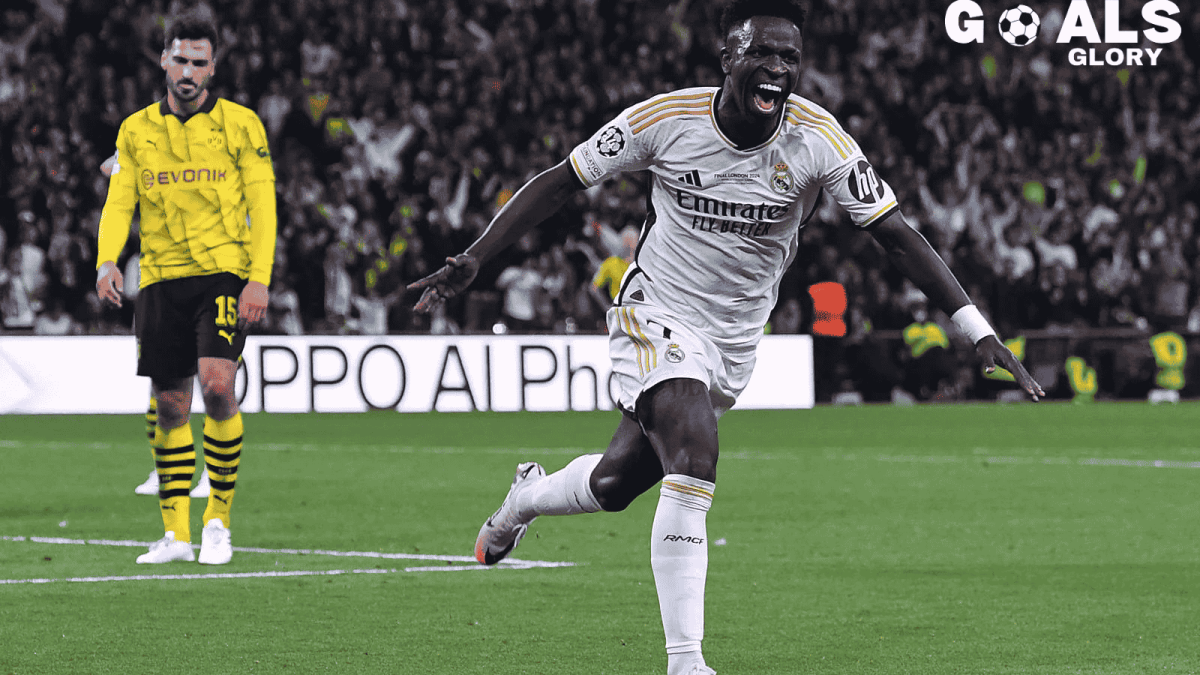 This image shows a football match moment featuring a Real Madrid player celebrating a goal, with a Borussia Dortmund player in the background. The text "GOALS GLORY" is present in the top right corner, enhancing the celebratory theme.