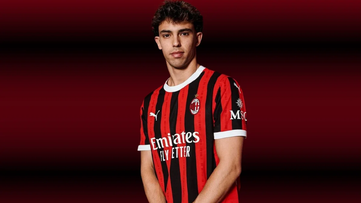 João Félix wearing an AC Milan jersey against a red and black gradient background.