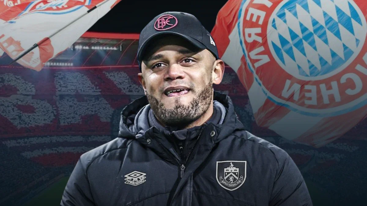 Vincent Kompany with Bayern Munich flags behind